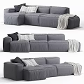 Modern Gray Sectional Sofa With Plush Cushions And Cozy Throw Blanket Design