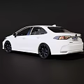 White Sporty Sedan With Sleek Modern Exterior Design And Black Alloy Wheels