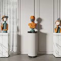 Modern Carved Figural Sculptures Artistic Display On Marble Pedestals In Elegant Room