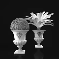 Ornate White Decorative Planters With Green Topiary And Palm Plant