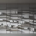 Modern Open Bookshelf With Light Toned Metal Frame And Decorative Items