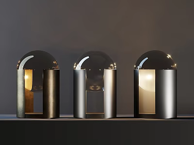 Three Modern Table Lamps With Sleek Metal Base And Transparent Glass Globe Illuminated Warm Light 3d model