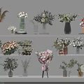 Decorative Ornament Arrangement With Various Vases Flower Bouquets And Green Plants On White Shelves