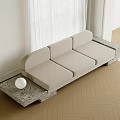 Modern Beige Three-Seater Sofa with Stone Base Design Near White Window Curtains