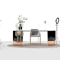 Black And Copper Desk With Green Plant Clear Decorative Balls Gray Chair And Studio Lights