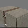 Decorative Ornament Set With Gray Textured Box Brown Strap And Metal Clasp