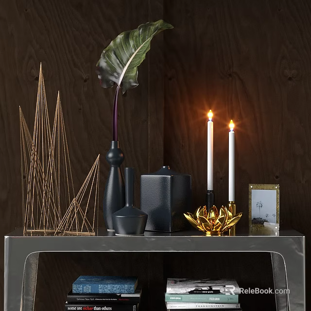 Decorative Ornament Set with Metallic Geometric Black Vase Lit Candles Golden Lotus and Photo Frame 3d model 