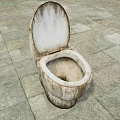 Dirty Stained Old Toilet Sitting On Stone Tiled Floor With Grime