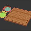 Wooden Go Board With Two Bowls Containing Black And White Stones