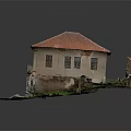 Old Two Story Building With Red Tile Roof Yellow Walls And Ruined Surrounding Grass