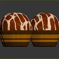 Spherical Sweet Desserts With Red And White Striped Cream In Brown Paper Cups