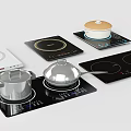 Modern Kitchen Induction Cooktops With Various Pans And Lids On