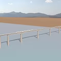 Modern Long Bridge Spanning Blue Water Over Brown Desert With Distant Mountain Range Scenery