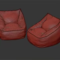 Two Stylish Bean Bag Chairs Black and Brown Leather Shiny on Sleek Gray Surface