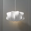 Modern White Petal Shaped Pendant Light Hanging Against Grey Wall Background