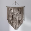 Boho Macramé Wall Hanging With Feather Design And Decorative Clay Vases On Wooden Table