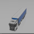 White Semi Trailer Truck With Blue Cargo Container And Reflective Surface