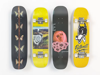 Four Skateboard Decks With Diverse Artwork Including Butterflies Scenery Baby And Cartoon Dog 3d model