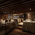 Elegant Restaurant Interior With Wooden Ceiling White Tablecloths And Dining Chairs