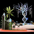 Decorative DNA Structure With Tree Branches Hanging Elements White Base Water And Plants