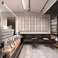 Modern Minimalist Café Interior With Black Counter Coffee Display And Circular Wall Decor