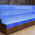 Restaurant Interior With Blue Glass Display Case And Dark Marble Wall 3d model