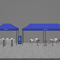 Public Facilities Setup With Blue Tents Tables Chairs Number 2 Signage And Barriers
