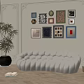 Elegant Living Room With Multi Seat Beige Sofa Framed Artworks And Potted Plant On Wooden Floor