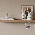 Stylish Wooden Shelf Decor With Rabbit Figurines Books And Framed Art Cards