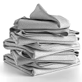 Soft Textured Towels Stacked With Light Gray And Blue Woven Patterns