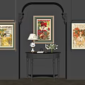 Vintage Poster Wall Decor With Black Console Table Lamp Books And Flowers