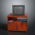 Vintage Old Computer Monitor On Wooden TV Stand With Blue Bowl And Books