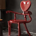 Red Single Chair With Unique Curved Arms And Glossy Artistic Design In Modern Room