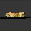 Golden Brown Shrimp Dumplings With Cheesy Topping On Green Plate