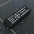 TV Remote Control As Essential TV Accessory With Black Body And White Buttons On Tabletop 3d model