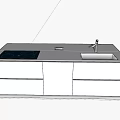 Modern Kitchen Countertop With White Cabinetry Black Stove Top Sink And Faucet