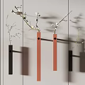 Modern Wall Decor With Black Orange Hanging Rods And White Flower Branches