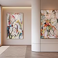 Vibrant Abstract Paintings With Colorful Hues Hanging In Modern Interior Space