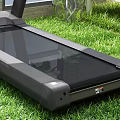 High Quality Outdoor Treadmill Fitness Equipment Standing On Fresh Green Grass Turf