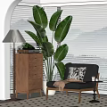 Comfortable Lounge Chair with Patterned Pillow Throw Blanket Wooden Chest Lamp and Large Green Plant