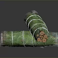 Wood And Stone Bundled In Green Net Rolls As Natural Construction Materials