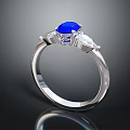 Elegant Fashion Ring Featuring Central Blue Sapphire And Diamond Accents On Silver Metal Band