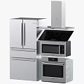 Modern Kitchen Appliances In Stainless Steel Featuring Refrigerator Microwave And Oven
