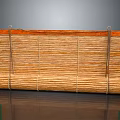Natural Bamboo Blinds with Brown Surface and Green Edges Rolled Up with Metal Hooks