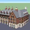 Historic Red Brick Building With Spire Tower Chimneys Arched Windows And Porch