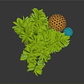 Green Indoor Plant in Brown Pot with Colorful Decorative Balls on Gray Background