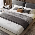 Contemporary Bedroom Interior Featuring Double Bed With Gray Upholstered Headboard White Sheets And Striped Blanket