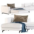 Modern Living Room Sectional Sofa With White Upholstery Brown Pillows And Soft Throw Blanket