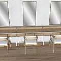 Wooden Dressing Table With Three Mirrors And Chairs In Sunlit Space