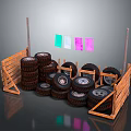 Stacked Car Tires In Wooden Frames With Colorful Cloth Pieces On Clothesline